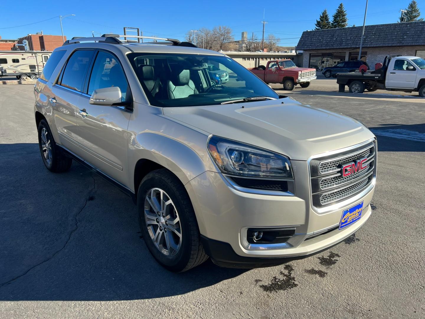 2016 Beige /Charcoal GMC Acadia SLT (1GKKVRKD2GJ) with an 3.6L V6 engine, automatic transmission, located at 116 5th Avenue South, Lewistown, MT, 59457, 47.063877, -109.427879 - Clean local trade with lots of options! Heated leather, sunroof, DVD! - Photo#0